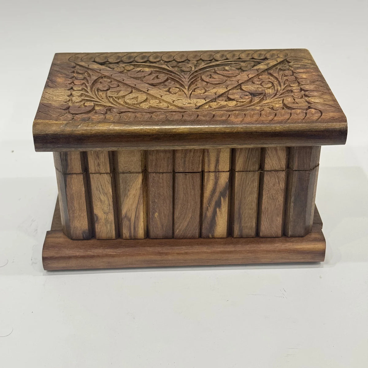 Carved wooden jewellery box with a brass safe lock, handmade in sheesham by Craft Edges, view 1 of 10