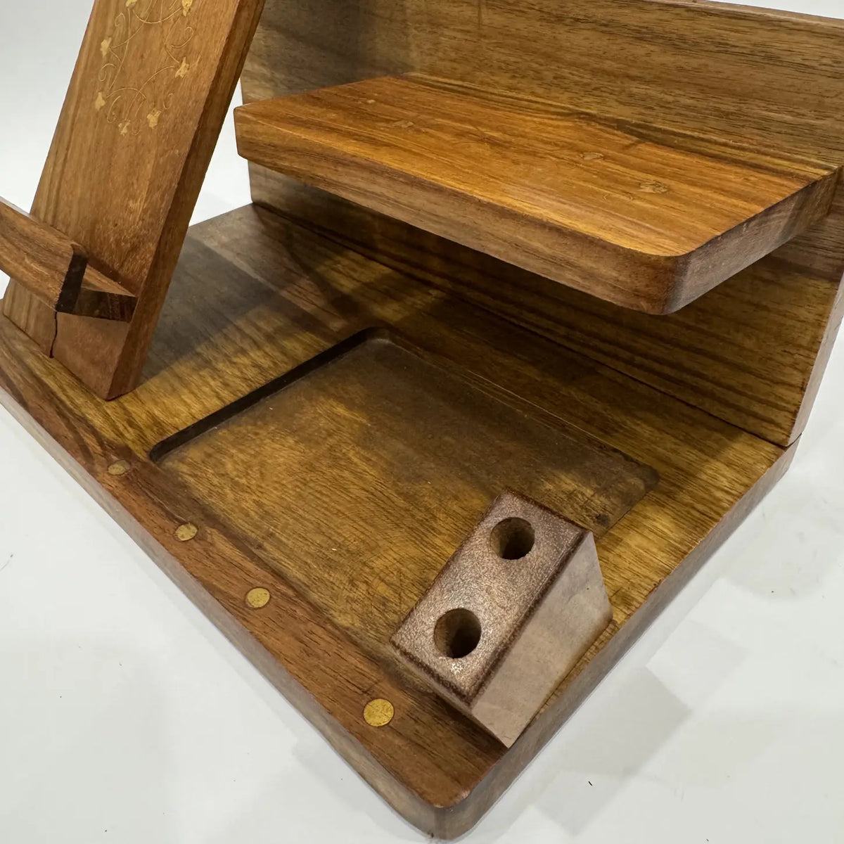 Top view of wooden desk organizer showing the raised shelf, tray compartment and pen block