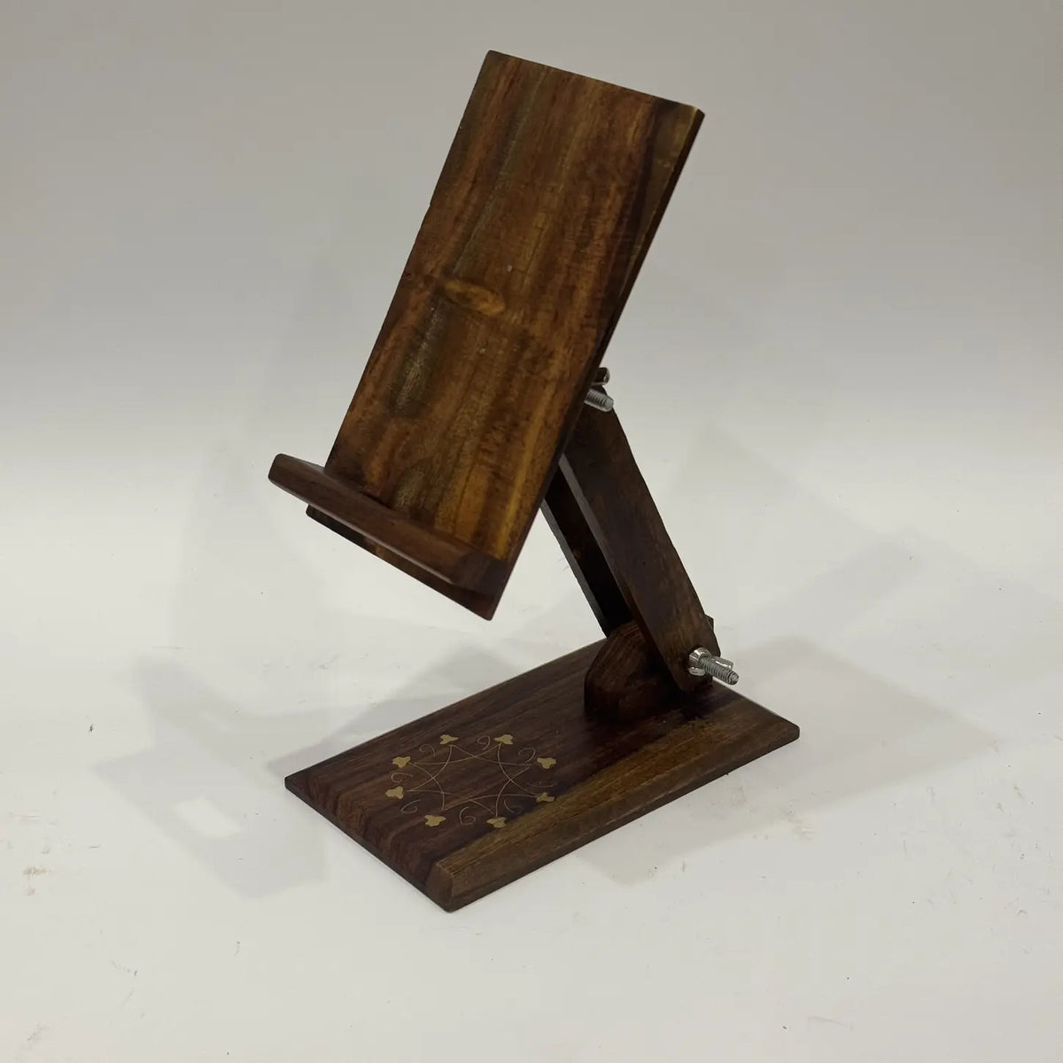 Brass inlay wooden phone stand rear view with two wing nuts for angle adjustment