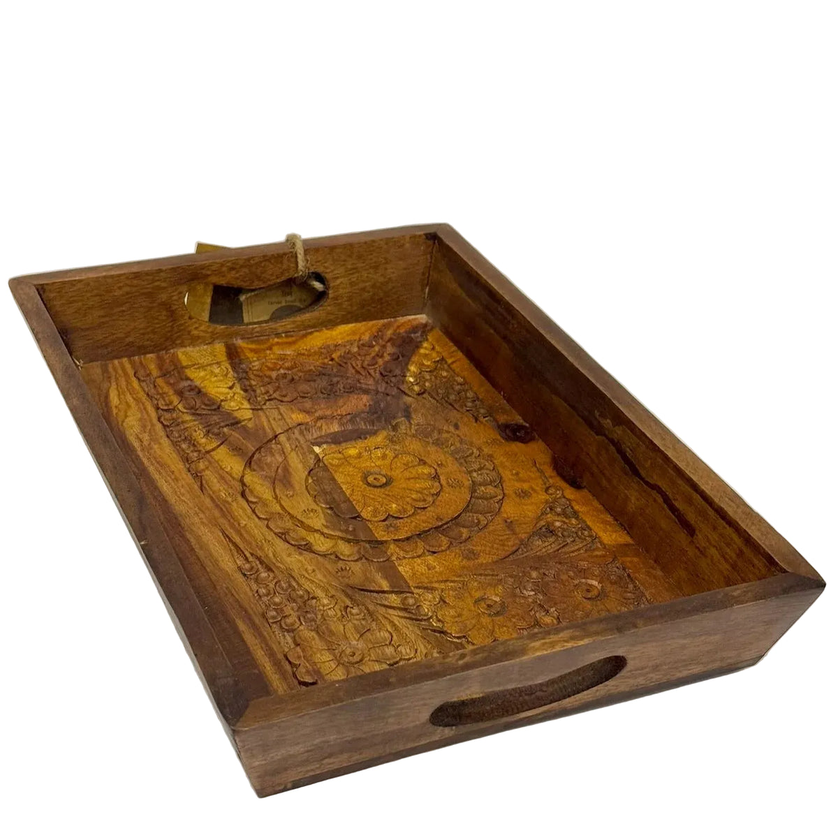 A rectangular wooden serving tray with carved decorative details on the interior and cutout handles on the sides, shown on a plain light background.